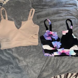 Two crop tops with slits in the front